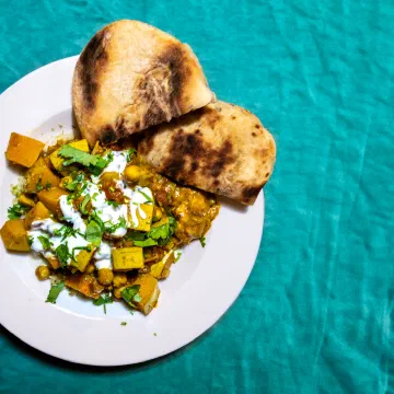 Pompoen curry met gebakken bloemkoolrijst